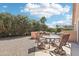 Private backyard space with covered patio, landscaping, and outdoor kitchen area at 2401 E Antigua Dr, Casa Grande, AZ 85194