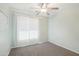 Bedroom with neutral paint, carpet, and a window at 2401 E Antigua Dr, Casa Grande, AZ 85194