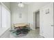 Cozy dining area with tile floors, a round table, and natural light from nearby windows at 2401 E Antigua Dr, Casa Grande, AZ 85194