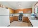 Bright kitchen with stainless steel appliances, tile floors, and plenty of cabinet space at 2401 E Antigua Dr, Casa Grande, AZ 85194