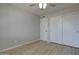 Bedroom featuring new floors, ceiling fan, and closets; a great room for relaxation at 2421 E Dragoon Ave, Mesa, AZ 85204