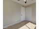 Bedroom featuring new floors, ceiling fan, and closets; a great room for relaxation at 2421 E Dragoon Ave, Mesa, AZ 85204