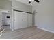 Bedroom featuring new floors and an attached bathroom at 2421 E Dragoon Ave, Mesa, AZ 85204