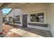 Welcoming covered entrance with a decorative front door offering shade and protection from the elements at 2421 E Dragoon Ave, Mesa, AZ 85204