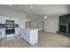 Modern kitchen flows into the living area, perfect for entertaining and Gathering time at 2421 E Dragoon Ave, Mesa, AZ 85204