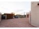 The backyard features a wooden shed, gravel, and an additional garage at 2430 N 56Th St, Phoenix, AZ 85008