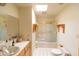Bathroom featuring decorative tile and a tiled shower/tub at 2430 N 56Th St, Phoenix, AZ 85008