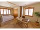 Bedroom and desk area featuring natural light and wood accents at 2430 N 56Th St, Phoenix, AZ 85008