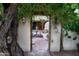 Charming courtyard view showcasing a fountain, outdoor seating, and a lush, verdant setting at 2430 N 56Th St, Phoenix, AZ 85008