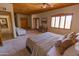 Comfortable bedroom featuring a wooden ceiling and shuttered windows at 2430 N 56Th St, Phoenix, AZ 85008