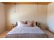 Cozy bedroom with pendant lighting and minimalist style at 2430 N 56Th St, Phoenix, AZ 85008