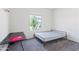 Bedroom featuring a bed frame and desk at 24559 W Flores Dr, Buckeye, AZ 85326