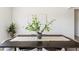 Stylish dining table with seating for six, complemented by modern decor at 24559 W Flores Dr, Buckeye, AZ 85326