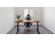 Office space featuring a wooden desk and office chair at 24559 W Flores Dr, Buckeye, AZ 85326