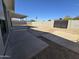 Backyard with concrete patios, block walls, and gate at 2544 N 52Nd Ave, Phoenix, AZ 85035