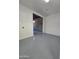 The basement has painted walls, a concrete floor, and a brick wall beyond the opening at 2544 N 52Nd Ave, Phoenix, AZ 85035