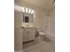 Clean bathroom with a white vanity and a shower and tub combination at 2544 N 52Nd Ave, Phoenix, AZ 85035