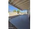 Covered patio with gray concrete and a view of the fenced backyard at 2544 N 52Nd Ave, Phoenix, AZ 85035