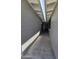 Walkway beside the house with concrete floor and painted block wall at 2544 N 52Nd Ave, Phoenix, AZ 85035