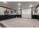 Large basement area with framed movie posters and a platform for seating at 2634 E Tamarisk St, Gilbert, AZ 85296