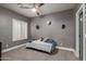 Relaxing bedroom with a neutral color scheme, plush carpet, and a cozy atmosphere at 2634 E Tamarisk St, Gilbert, AZ 85296