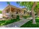 Charming single-Gathering home with a cozy covered porch and manicured lawn at 2634 E Tamarisk St, Gilbert, AZ 85296