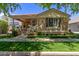 Charming single-Gathering home with a cozy front porch and manicured lawn at 2634 E Tamarisk St, Gilbert, AZ 85296