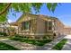 Charming single-story home featuring a well-manicured lawn and paved driveway at 2634 E Tamarisk St, Gilbert, AZ 85296