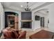 Inviting living room with a modern fireplace and sauna, creating a cozy and luxurious ambiance at 2634 E Tamarisk St, Gilbert, AZ 85296