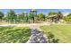 Community playground area with play structures and picnic seating for families at 2634 E Tamarisk St, Gilbert, AZ 85296