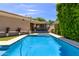 Beautiful backyard pool with seating area, ideal for enjoying outdoor living at 2634 E Tamarisk St, Gilbert, AZ 85296