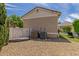 Gravel side yard featuring air conditioning units and access to the backyard at 2634 E Tamarisk St, Gilbert, AZ 85296