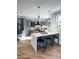 Well-equipped kitchen with gray cabinets, a large island, and pendant lighting at 2707 E James St, Gilbert, AZ 85296