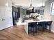 Modern kitchen with gray cabinetry, stainless steel appliances, and a large center island at 2707 E James St, Gilbert, AZ 85296