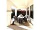 Inviting covered patio features stylish outdoor seating with views of lush landscaping at 2707 E James St, Gilbert, AZ 85296