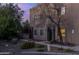 Charming two-story townhouse with beautiful desert landscaping and inviting entryway at 2826 E Tracy Ln # 3, Phoenix, AZ 85032