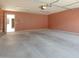 Spacious two-car garage with overhead lighting and automatic door at 2826 E Tracy Ln # 3, Phoenix, AZ 85032