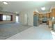 Combined view of living room, kitchen with stainless steel appliances and natural light at 2826 E Tracy Ln # 3, Phoenix, AZ 85032