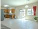 Eat-in kitchen with stainless steel appliances, modern fixtures, and sliding door to outdoor at 2826 E Tracy Ln # 3, Phoenix, AZ 85032