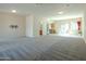 Open concept living room and kitchen with modern finishes, stainless steel appliances and natural light at 2826 E Tracy Ln # 3, Phoenix, AZ 85032
