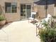 Secluded patio area with seating, table, and desert landscaping for outdoor enjoyment at 2826 E Tracy Ln # 3, Phoenix, AZ 85032