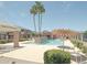 Community pool with palm trees and plenty of space to relax at 2826 E Tracy Ln # 3, Phoenix, AZ 85032