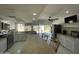 Bright, open kitchen with stainless steel appliances and a large island perfect for entertaining at 3738 W Danbury Dr, Glendale, AZ 85308