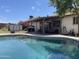 Inviting pool area with a covered patio, perfect for relaxation and outdoor entertaining at 3738 W Danbury Dr, Glendale, AZ 85308