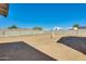 Large backyard with block fence, offering privacy at 3840 W Abraham Ln, Glendale, AZ 85308