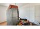 Bedroom showcasing a closet organizer, neutral carpet and white walls at 3840 W Abraham Ln, Glendale, AZ 85308