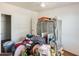 Bedroom cluttered with neutral carpet and ceiling fan at 3840 W Abraham Ln, Glendale, AZ 85308
