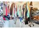 Walk-in closet with ample hanging space and shelving for optimal organization at 3840 W Abraham Ln, Glendale, AZ 85308