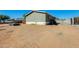 Back exterior and metal container at 3840 W Abraham Ln, Glendale, AZ 85308