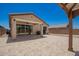 Large backyard patio with covered seating area at 40470 W Agave Rd, Maricopa, AZ 85138
